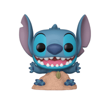 Stitch in Sand vinyl figure: blue alien with purple ears, smiling on sand mound