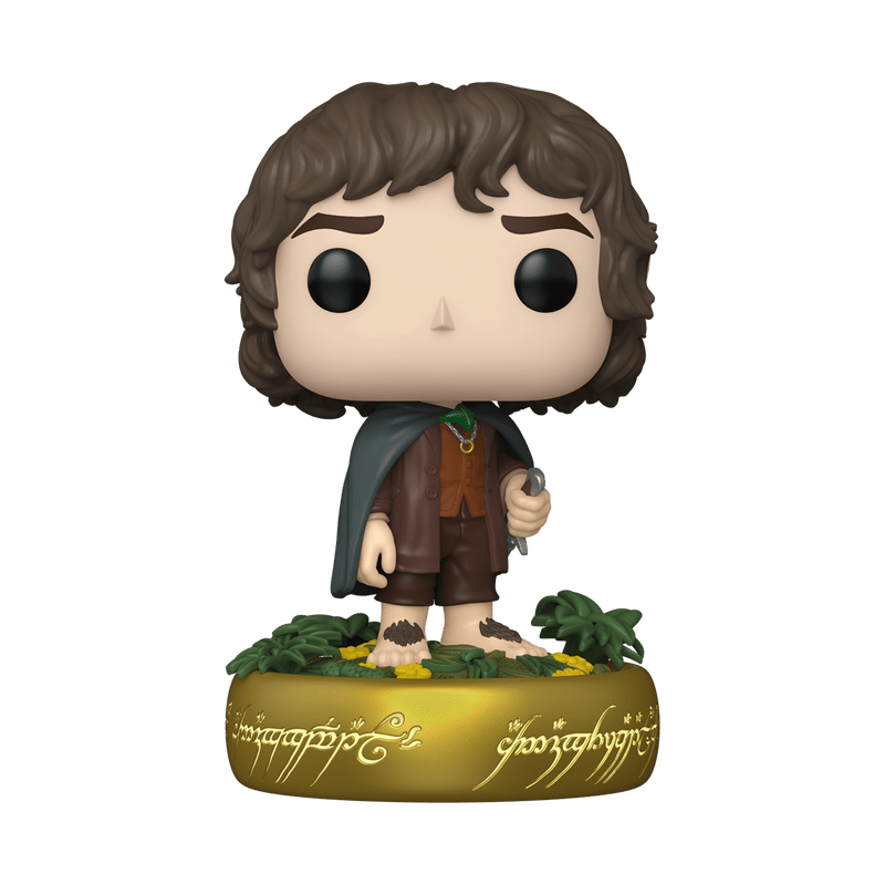 Frodo Baggins (Glow) Funko figure with dark hair, cloak, holding tool on base