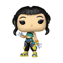 Zoey vinyl figure standing, black hair, teal and yellow outfit with star charms