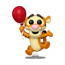 Tigger-Vinylfigur springt mit rotem Ballon auf Sockel