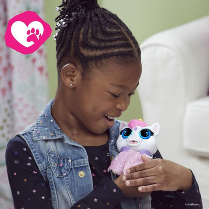 Child holding a blue cat interactive toy with fuzzy yellow vest and purple details