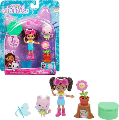 Loose action figure set: girl doll, kitty figure, flower pot, and green slime