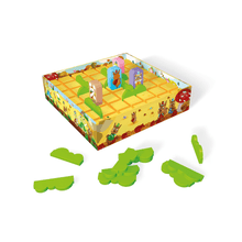 Quoridor Junior board game with yellow grid board and green tunnel pieces