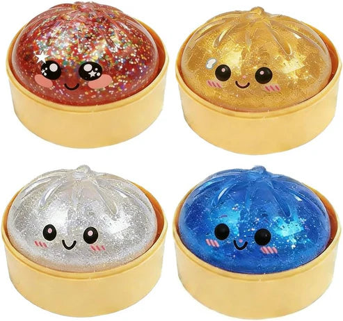 Mini glitter dumpling squishies: red, gold, silver, blue domes in round bases