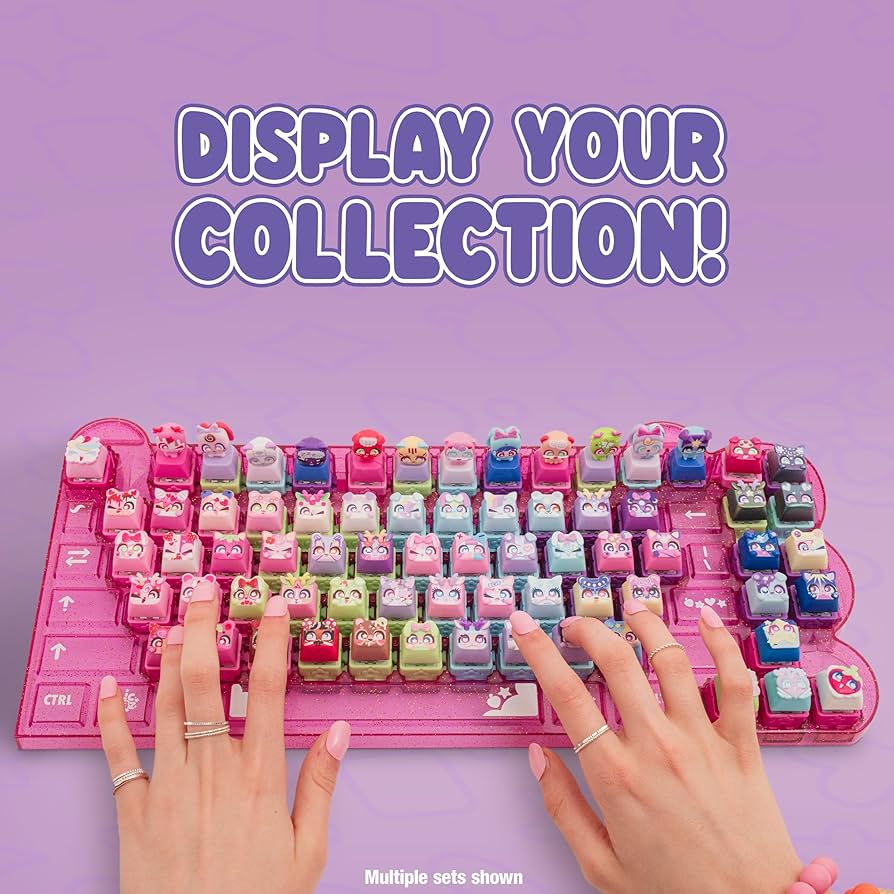 Purple Clickeez keyboard showing row of character key caps with fingers pressing keys