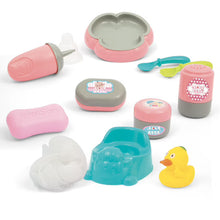 Baby bath accessories set: pink soap, sponge, cup, duck toy, and tub parts
