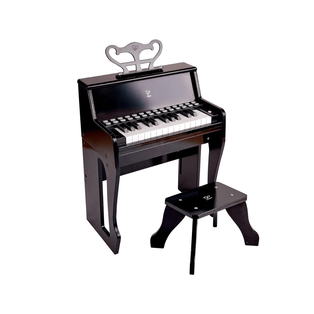 Black upright piano toy with keyboard, top music piece, and matching bench