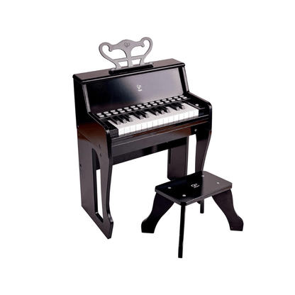 Black upright piano toy with keyboard, top music piece, and matching bench