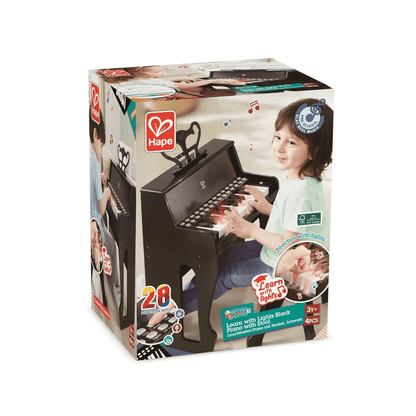 Upright piano toy box showing a black piano and kids playing illustration