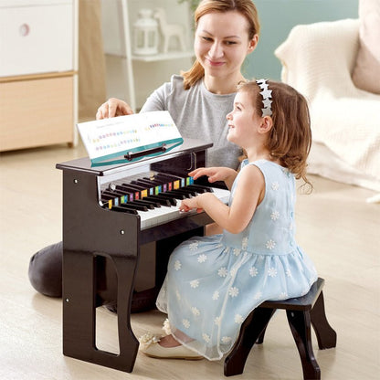 Black upright piano toy with colorful keys and matching bench
