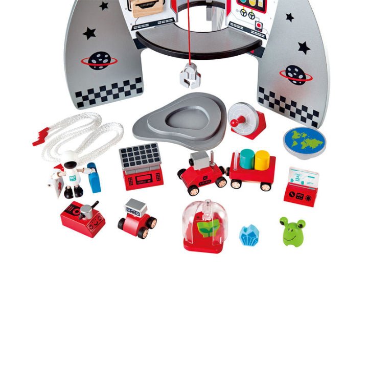 Rocket ship playset accessories with space-themed pieces and small vehicles