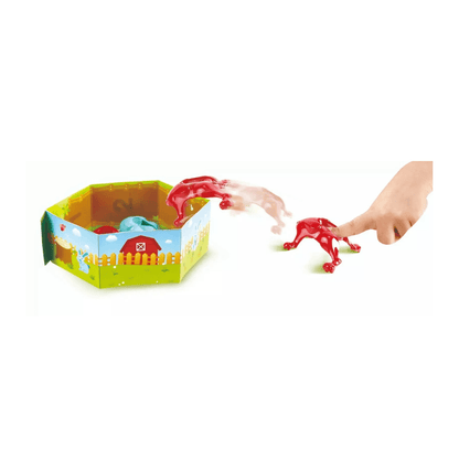 Jumpin' Bunnies game set playpen with red bunny figures and child hand