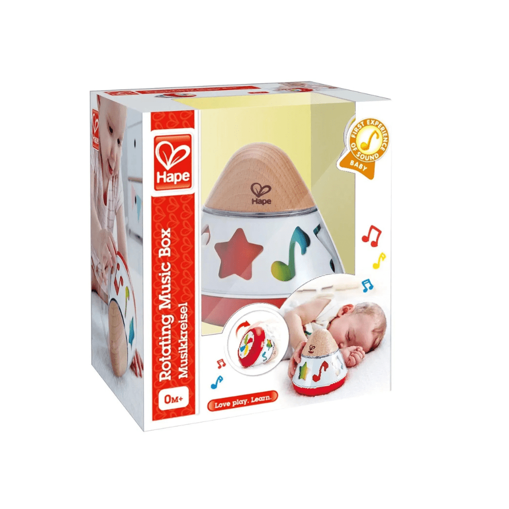 Rotating music box toy in printed retail box with wooden dome and music icons