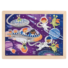 Wood-framed space jigsaw puzzle with astronaut and alien figures on interlocking pieces
