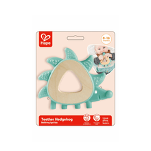 Hedgehog teether toy with teal plastic body, beige insert, and textured spikes