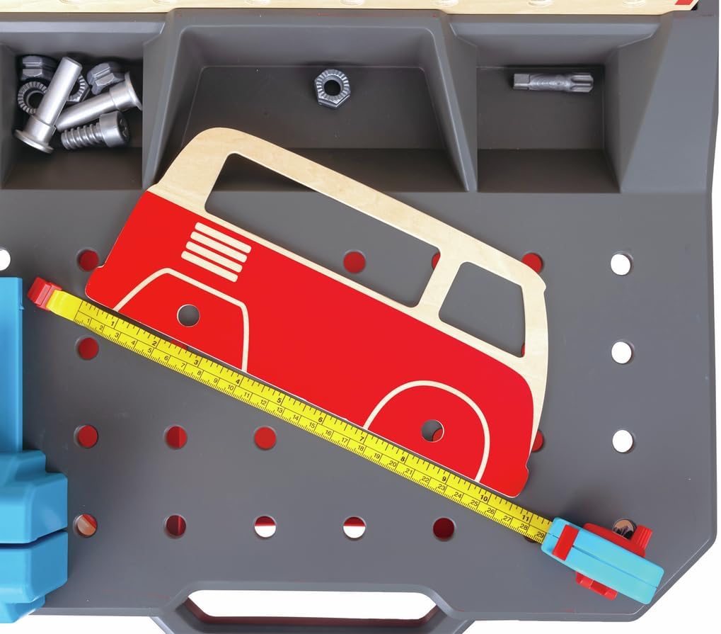 Vehicle repair workbench detail with red-and-blue toy car, ruler scale, and tools