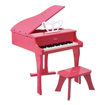 Pink toy grand piano with matching bench