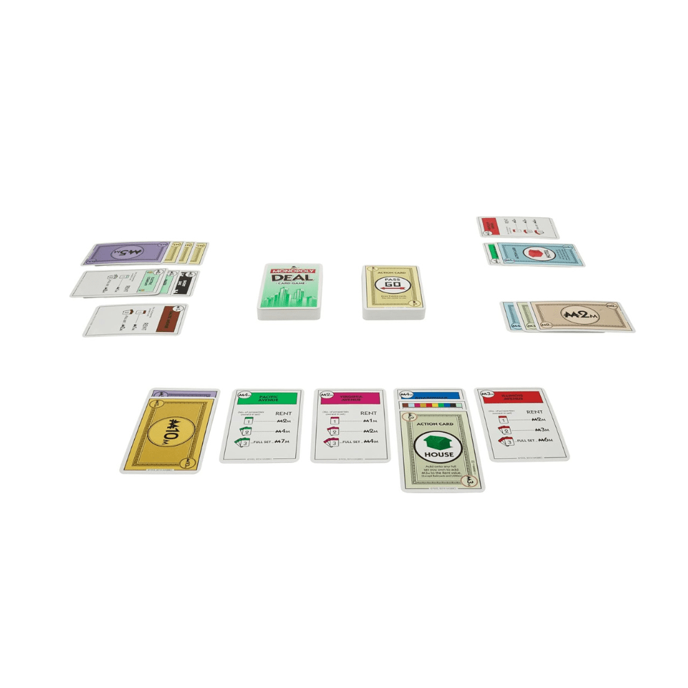 Property trading card game cards fanned out, including rent and action cards