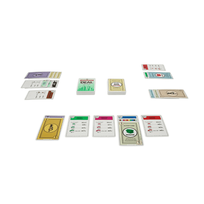 Property trading card game cards fanned out, including rent and action cards