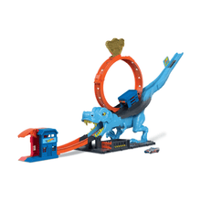 T-Rex chomp down playset with blue dinosaur, orange ring track, and red station building