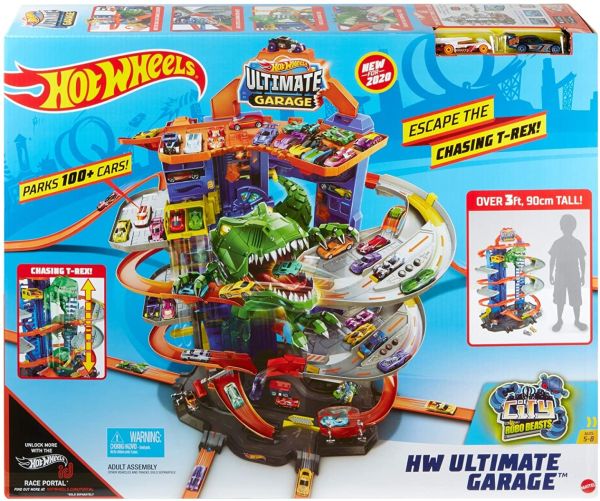 Toy car track playset box art with blue tower, orange ramps, and green dinosaur action