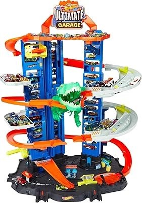 Toy car track garage set with blue tower, orange ramps, and green T-Rex figure