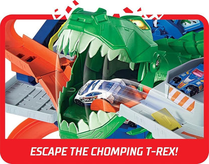 Close-up of green T-Rex dinosaur figure inside toy car track garage set