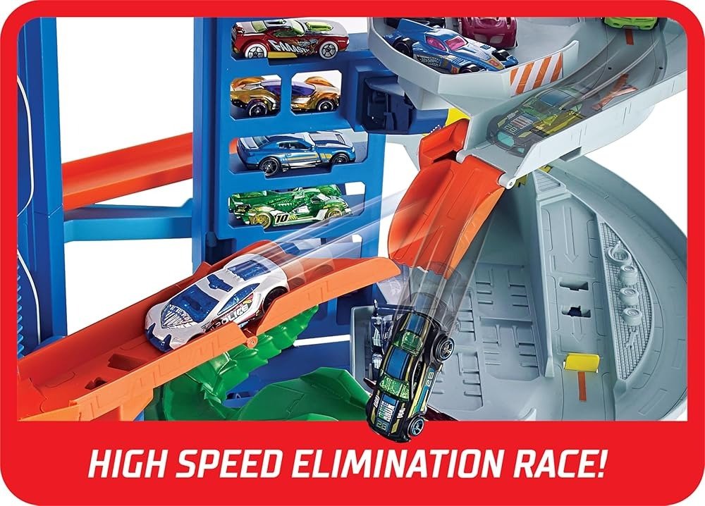 Toy car track detail with orange lane, red divider, and cars on grey curved ramp