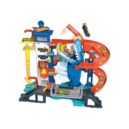 Shark-themed Hot Wheels parking garage playset with blue shark, orange and blue ramps