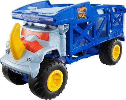 Blue monster truck with gray cab, orange details, yellow wheel rims