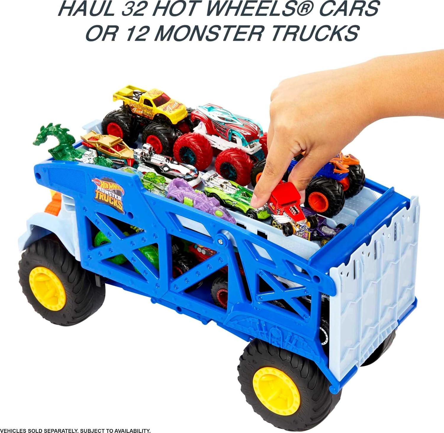 Blue monster truck carrier with loaded mini cars and yellow wheels on ramp