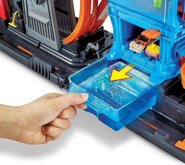 Car wash playset flume with blue water tray and orange warning symbol, track detail
