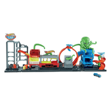 Hot Wheels car wash playset with green octopus figure, blue base and orange track