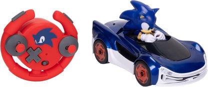 Red circular RC controller with button layout and Sonic-style blue drifting car