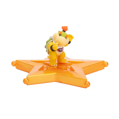 1.5-inch Galaxy Movie figure: gelbe Figur mit orangeem Zubehör auf orange Sternplattform