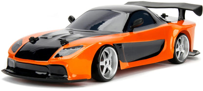 Dreiviertelansicht: orange-schwarzer 1:10 RC Drift Mazda RX-7 mit weißem Frontgrill