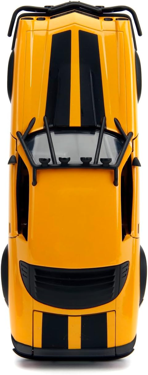 Bumblebee 1:24 car rear view, yellow-orange body with black grille and panel lines