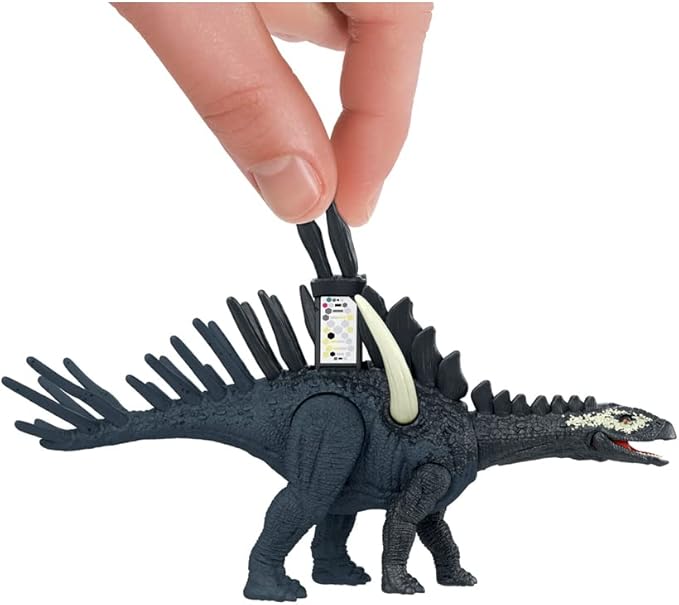 Dark blue spiked dinosaur action figure with pale dorsal fin, standing pose