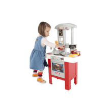 Miele Starter Kitchen playset with child cooking at stove and pot