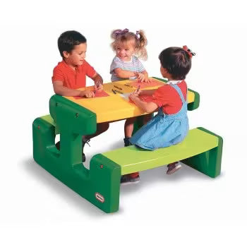 Children's picnic table with green frame, yellow tabletop, and two low bench seats