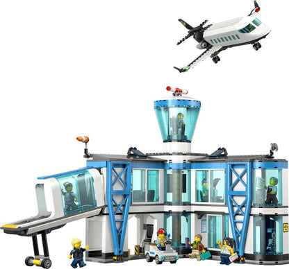 Airport terminal with airliner above, blue tower, minifigures and cart