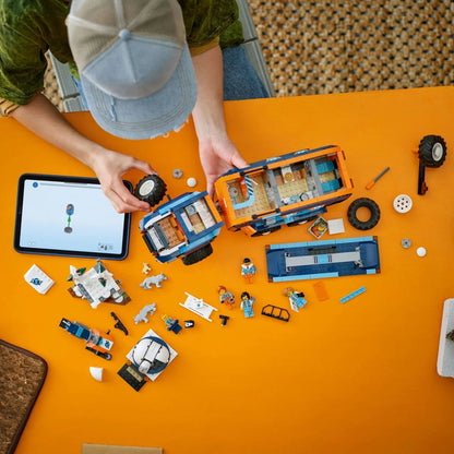 Arctic Explorer Science Lab Truck parts spread out on table, including figures and vehicle frame