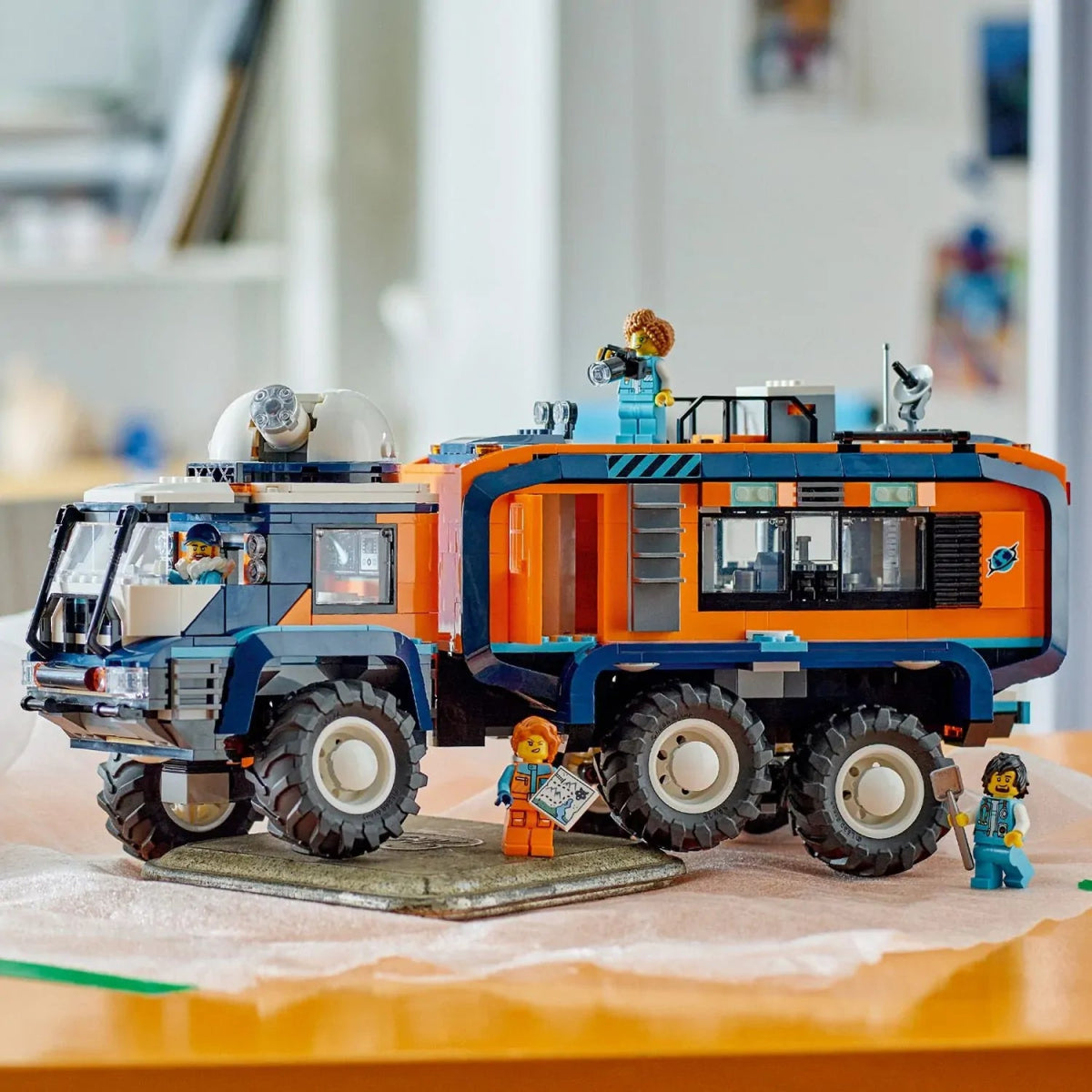 Side view of Arctic Explorer Science Lab Truck with lab dome and side compartments