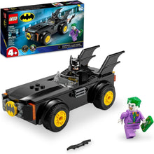 LEGO Batman Batmobile with black body, yellow wheels, Batman minifigure, accessory gun