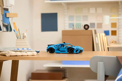Corvette Stingray Blue model car on a workbench, side view