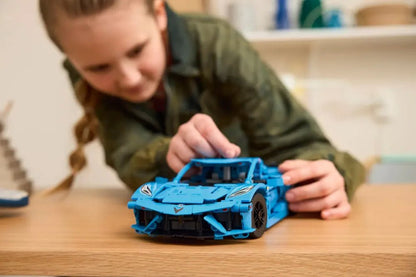 Corvette Stingray Blue LEGO model car held on a tabletop, front view