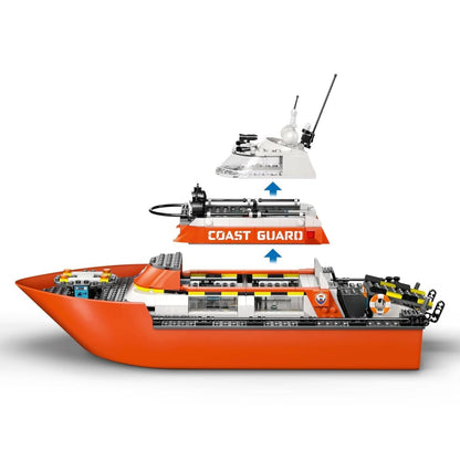 Coast Guard rescue helicopter model, orange-and-white cockpit with black rotors
