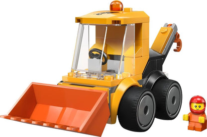 Yellow wheel loader with orange front bucket and clear cab, LEGO figure included