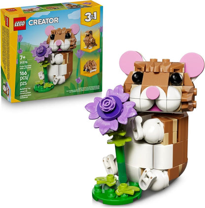 LEGO-style hamster build with purple flower, pink ears and white paws on green base