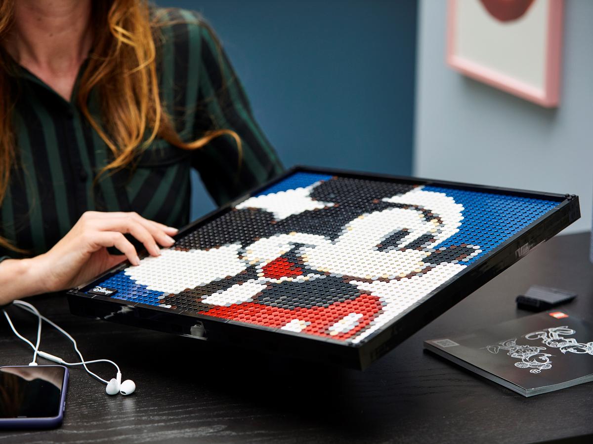 Mickey Mouse LEGO mosaic board with blue background and red shorts